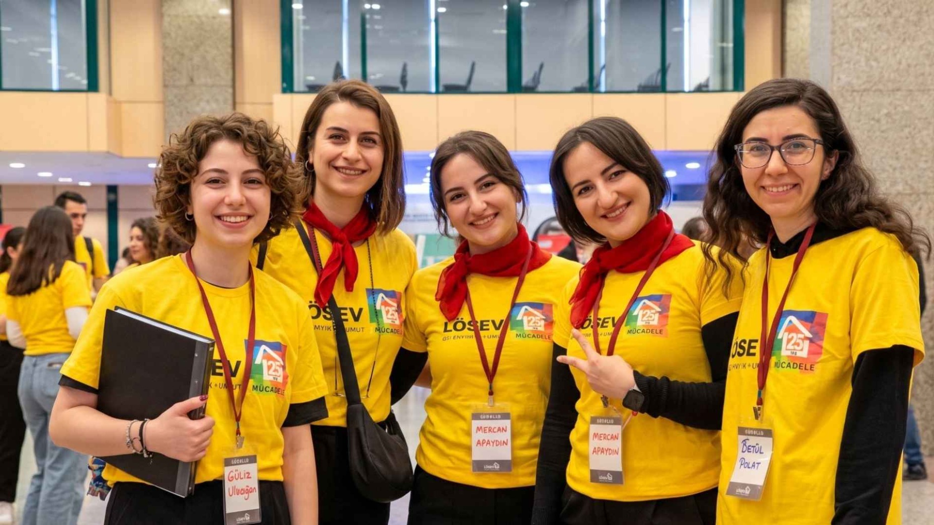 LÖSEV FAYDA Club members participating in a university event and awareness activity.