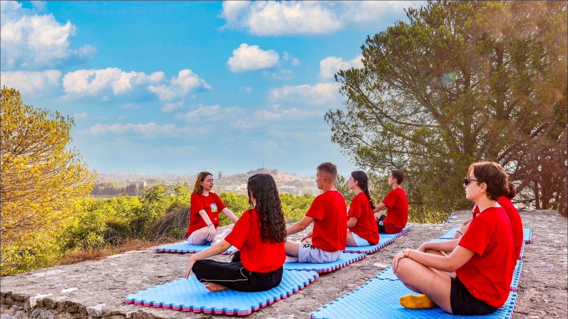 Young cancer survivors spending time together outdoors at LÖSEV Youth Camps.